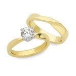 Mobius Twist engagement ring and wedding band Mobius Twist from The Brown Goldsmiths Signature Ring Collection